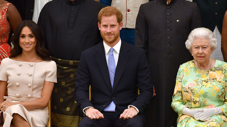 Meghan Markle, il principe Harry e la regina Elisabetta
