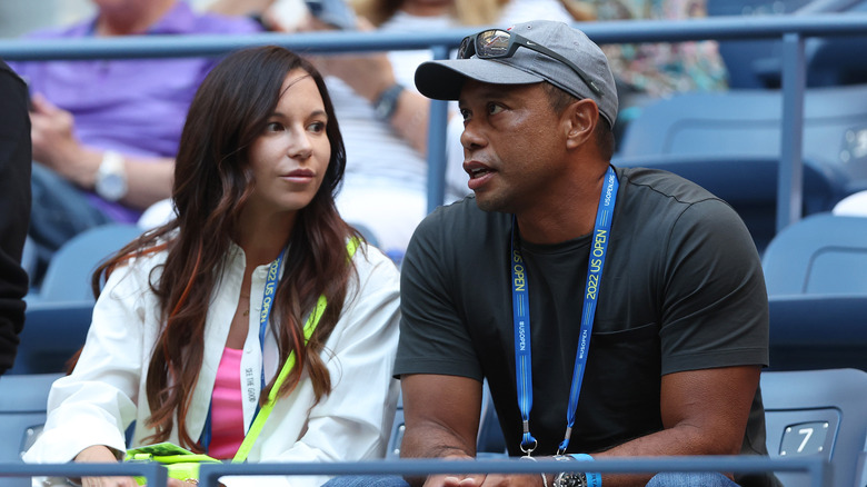 Erica Herman e Tiger Woods siedono agli US Open
